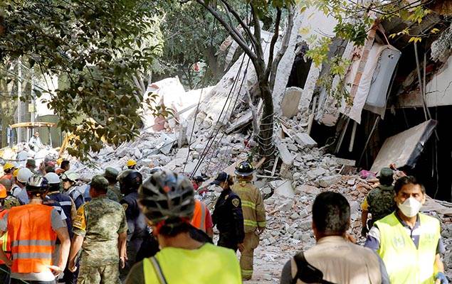 A collapsed building is seen after an earthquake in Mexico City