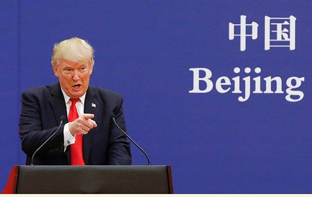 U.S. President Donald Trump and China's President Xi Jinping meet business leaders at the Great Hall of the People in Beijing